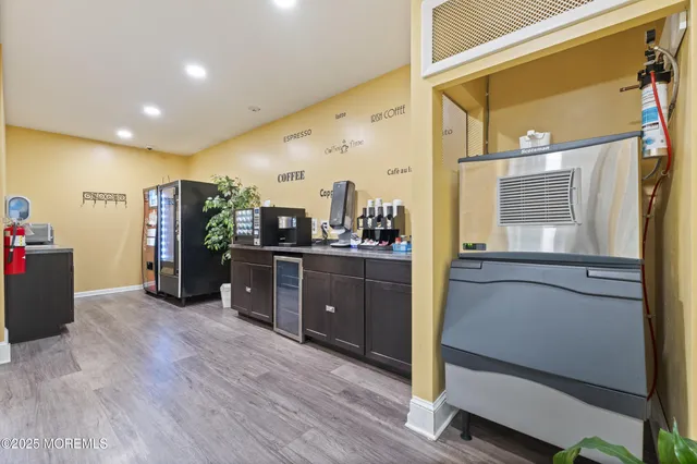 a view of a kitchen with a sink