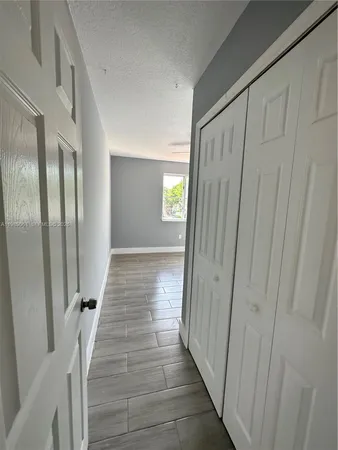 a view of a room with racks on the wall