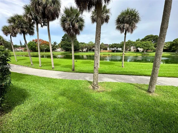 a view of a park and entertaining space