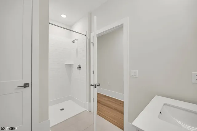 a bathroom with a shower and bathtub