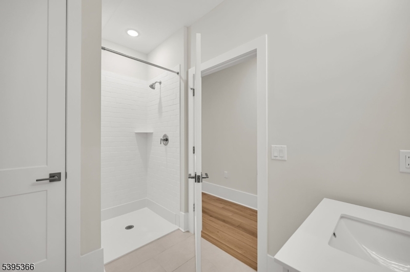 127 Myrtle Road Warren, NJ 07059 - Photo 21 of 27 a bathroom with a shower and bathtub