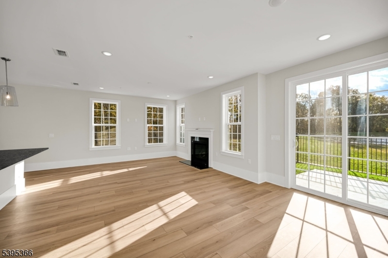 127 Myrtle Road Warren, NJ 07059 - Photo 10 of 27 a view of a room with wooden floor and a window