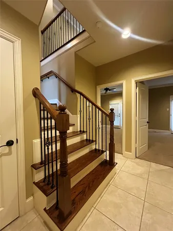 a view of a hallway with staircase
