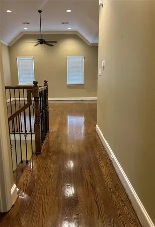 a hallway with a wooden floor