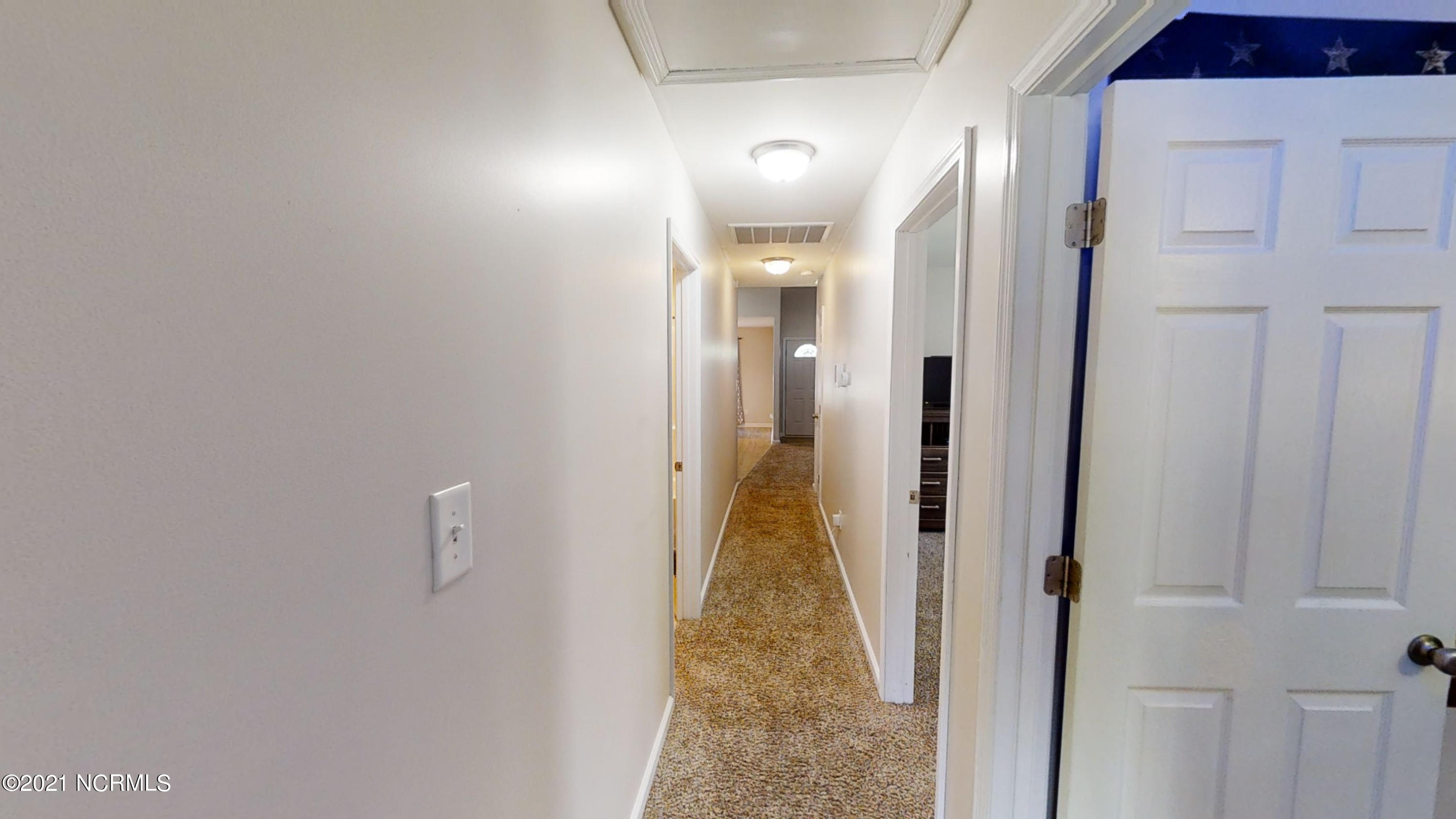 283 Richlands Loop Road Richlands, NC 28574 - Photo 33 of 44 33 - Hallway towards Living Room