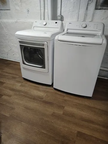 a utility room with dryer and washer