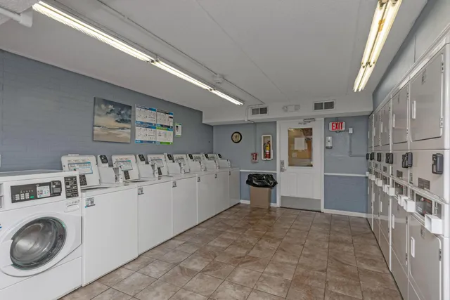 a view of a storage & utility room with washer and dryer