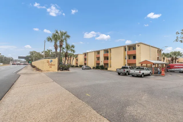 a view of a car park in front of house