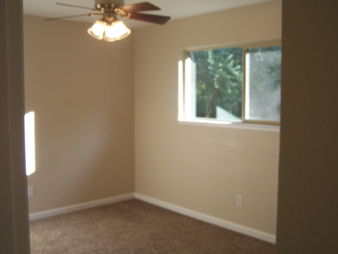 17824 Walker Mine Road Redding, CA 96003 - Photo 8 of 12 an empty room with a window