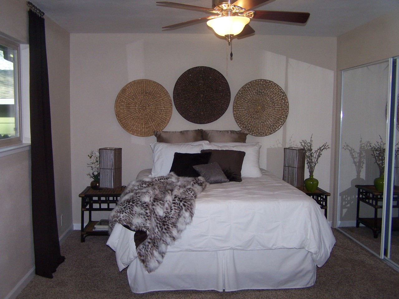 17824 Walker Mine Road Redding, CA 96003 - Photo 9 of 12 a bedroom with a bed and a chandelier