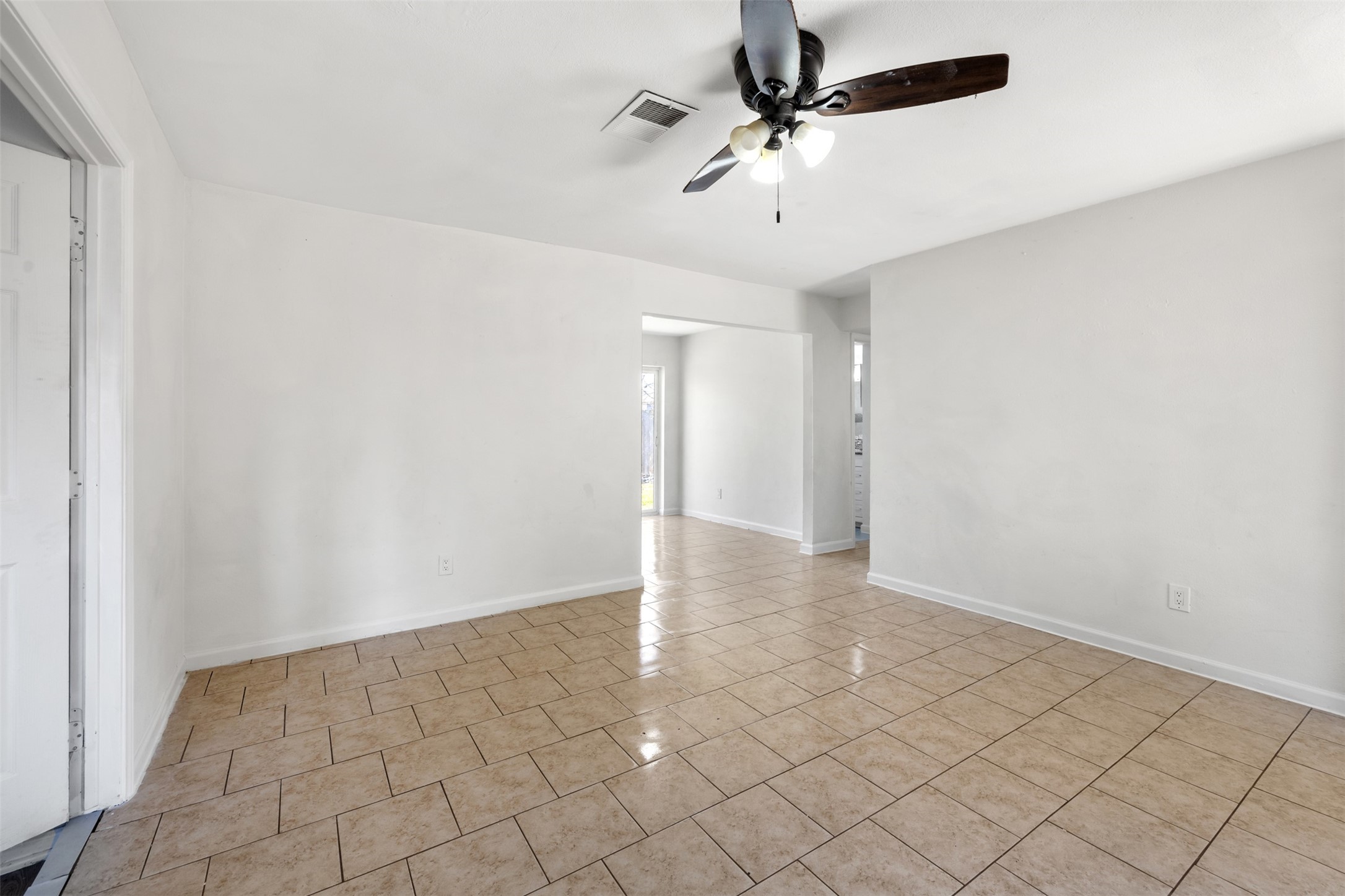 9802 Lum Lane Houston, TX 77078 - Photo 5 of 45 Another view of the living room in main home next to 4th bedroom