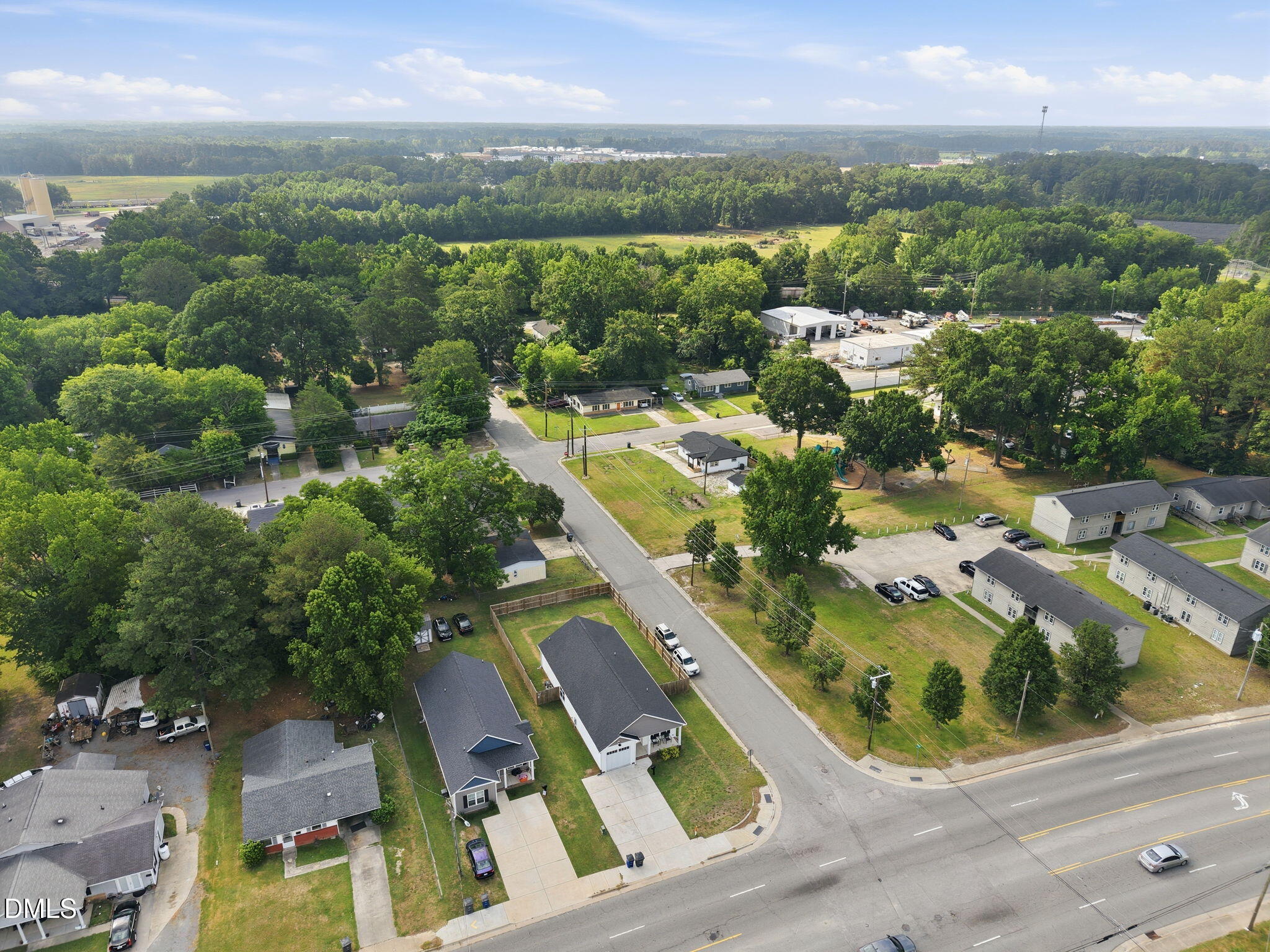 709 South Pollock Street Selma, NC 27576 - Photo 30 of 30 an aerial view of a house with a swimming pool