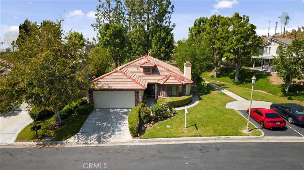 2653 Hampton Way Riverside, CA 92506 - Photo 1 of 1 a front view of house with yard and green space