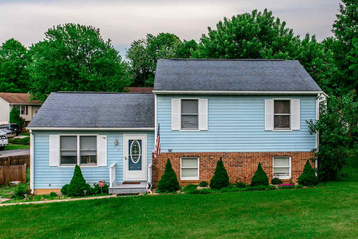33 Ox Road Waynesboro, VA 22980 - Photo 14 of 17 a front view of a house with a garden and yard