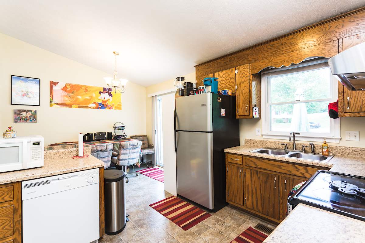 33 Ox Road Waynesboro, VA 22980 - Photo 3 of 17 a kitchen with a refrigerator and a sink