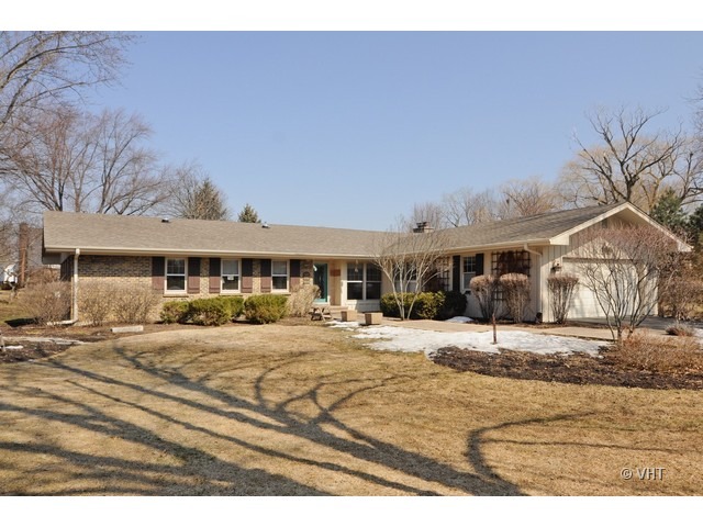 170 Cold Spring Road Barrington, IL 60010 - Photo 1 of 10 a front view of a house with a yard