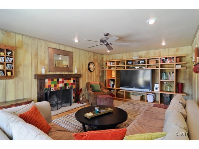 170 Cold Spring Road Barrington, IL 60010 - Photo 6 of 10 a living room with furniture and a flat screen tv