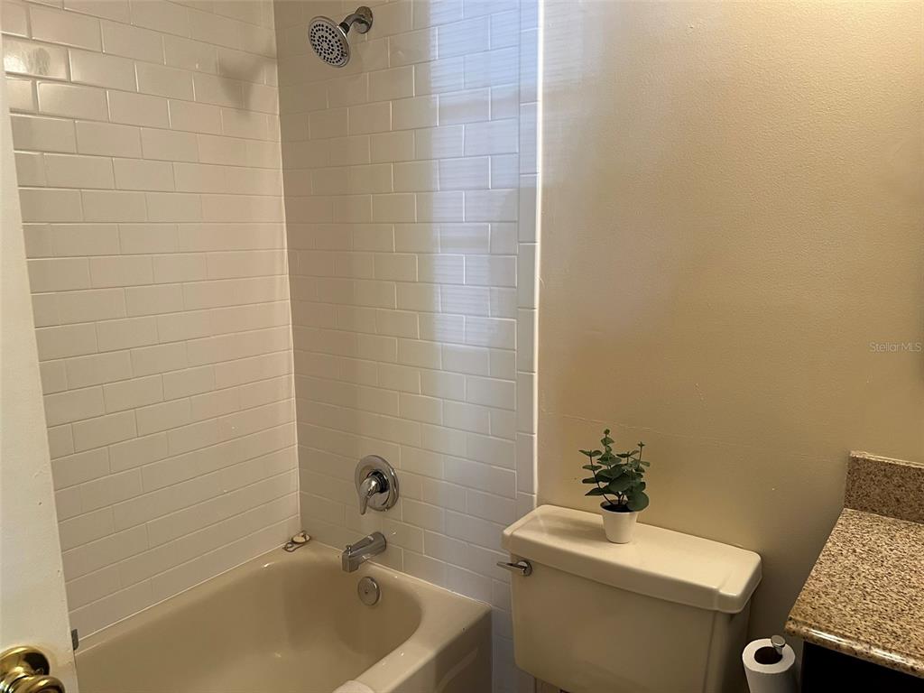 624 Cambridge Way, Unit 108 Altamonte Springs, FL 32714 - Photo 14 of 22 a bathroom with a sink and toilet