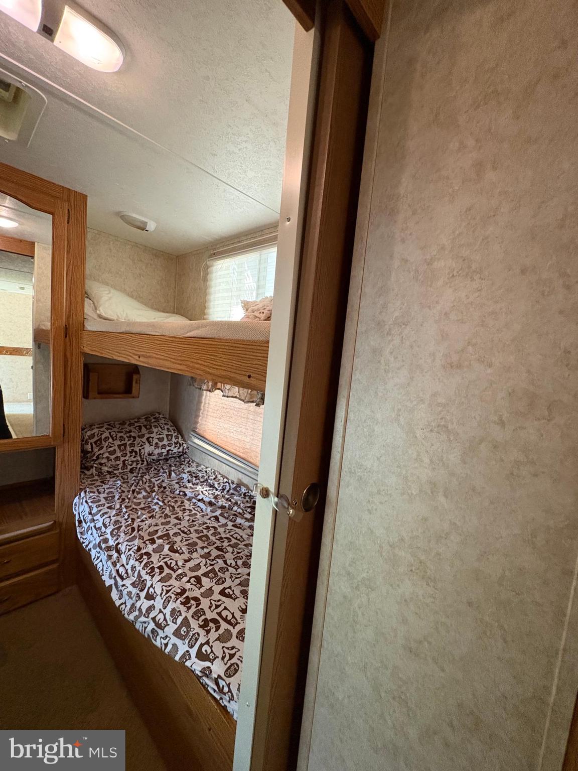 6-20 Boo Boo Boulevard Falling Waters, WV 25419 - Photo 13 of 16 a bathroom with a bathtub