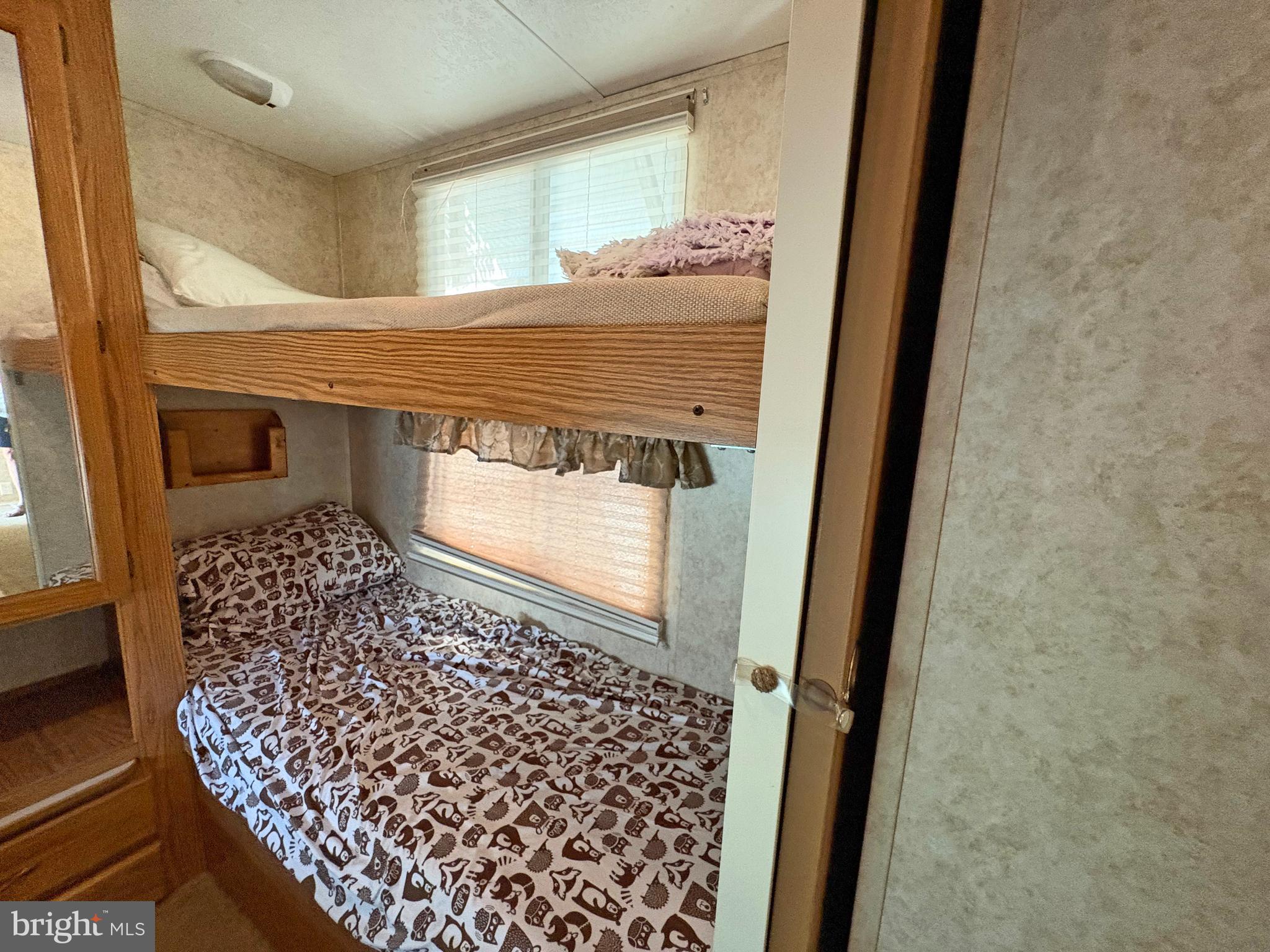 6-20 Boo Boo Boulevard Falling Waters, WV 25419 - Photo 15 of 16 a bathroom with a bathtub and shower
