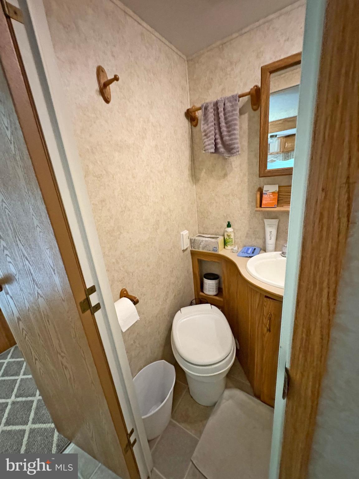 6-20 Boo Boo Boulevard Falling Waters, WV 25419 - Photo 10 of 16 a bathroom with a toilet a sink and a shower