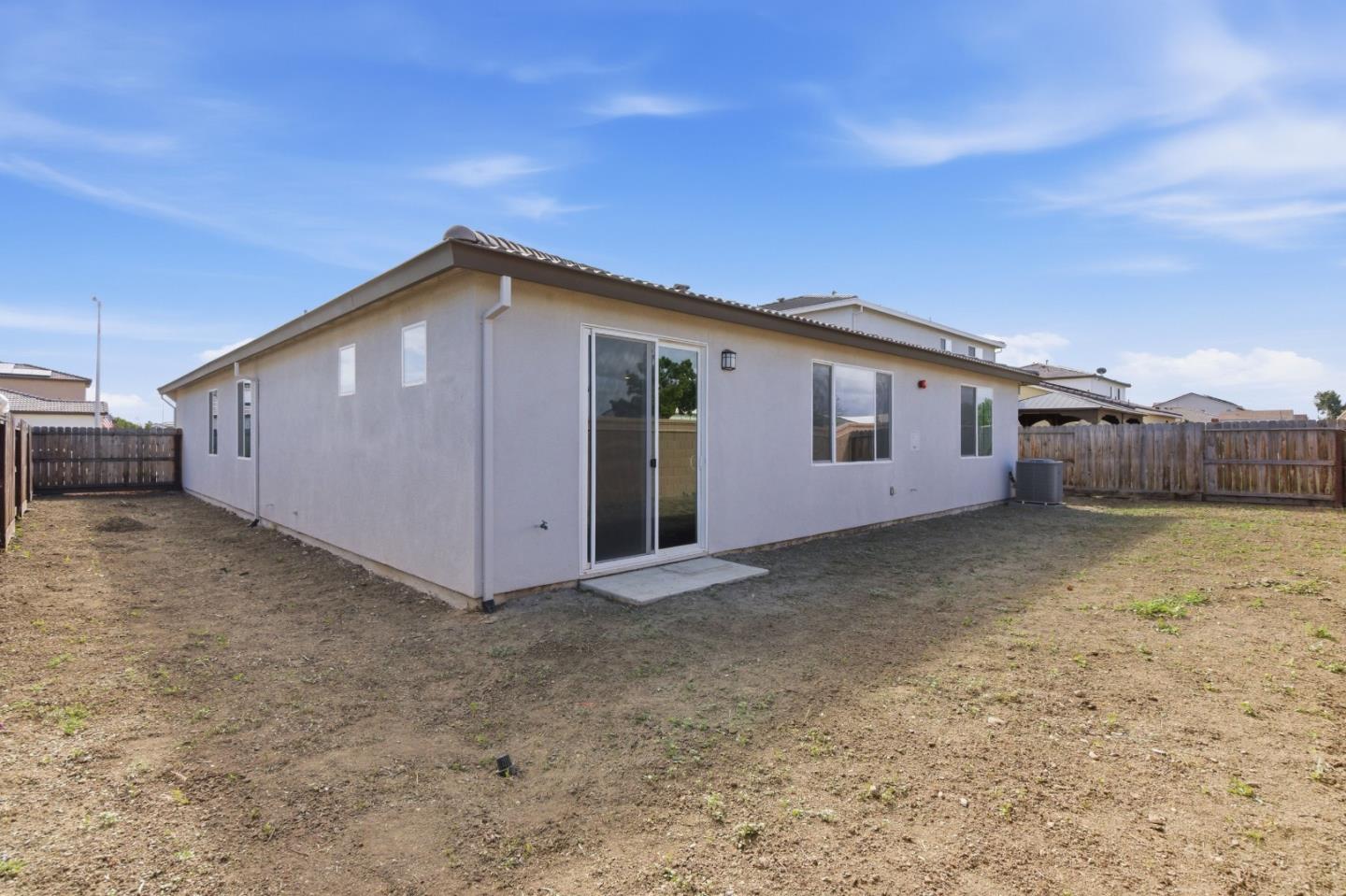 331 Lolly Way Los Banos, CA 93635 - Photo 27 of 31 a view of a house with backyard