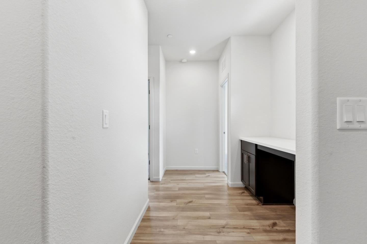 331 Lolly Way Los Banos, CA 93635 - Photo 8 of 31 a view of a livingroom with wooden floor
