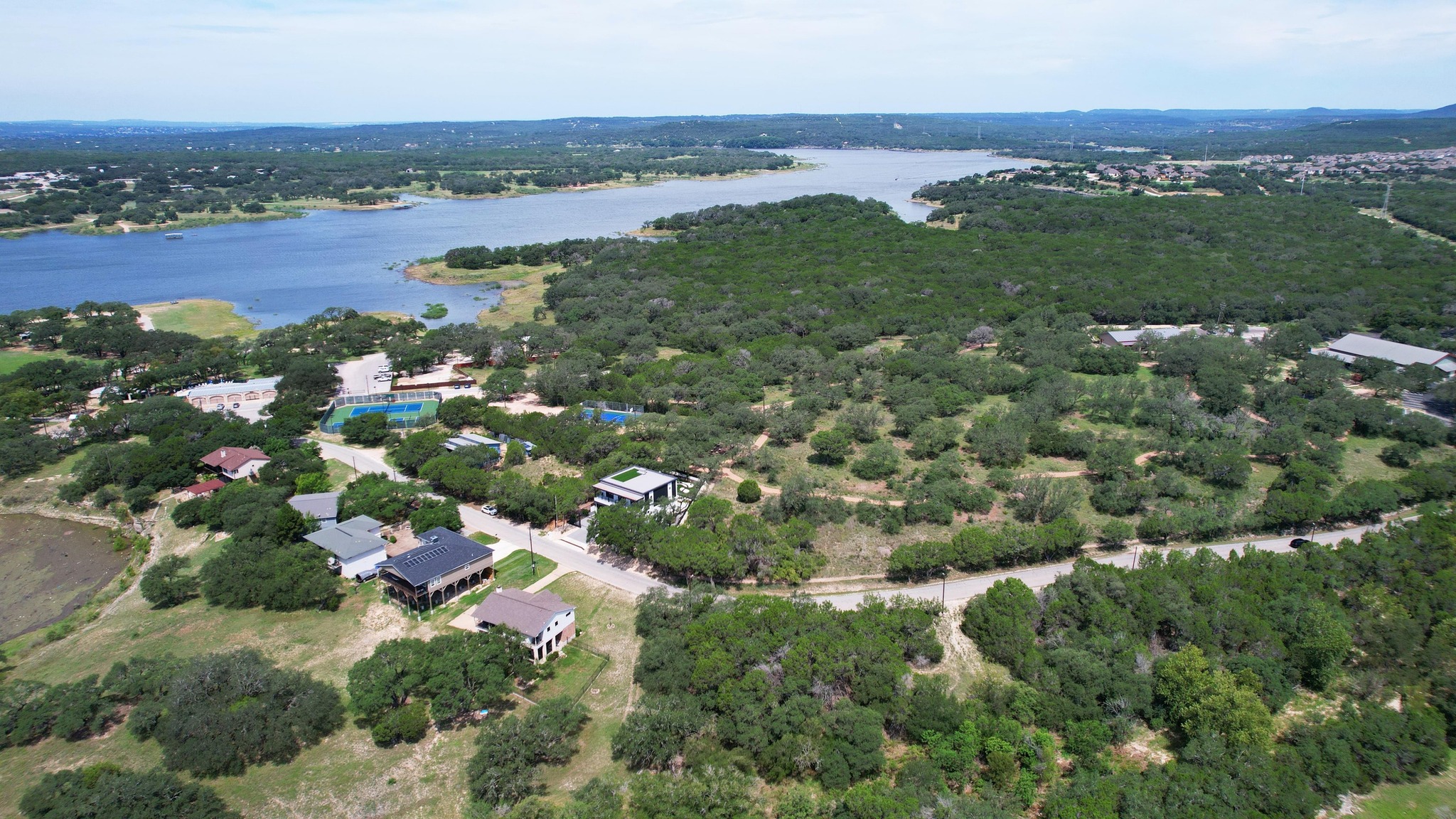 6719 Bar K Ranch Road Lago Vista, TX 78645 - Photo 16 of 36 a view of lake and mountain