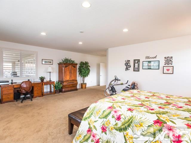 2035 Back Nine Trail Reno, NV 89523 - Photo 11 of 25 a bedroom with a bed and furniture
