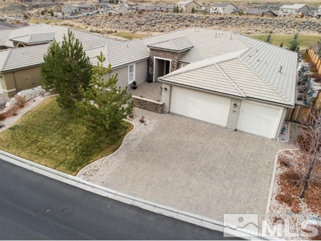 2035 Back Nine Trail Reno, NV 89523 - Photo 2 of 25 an aerial view of a house with a yard and ocean