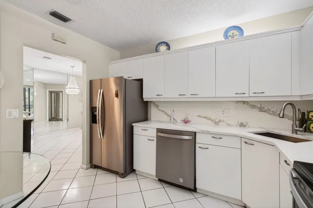 a view of a livingroom with furniture and a window