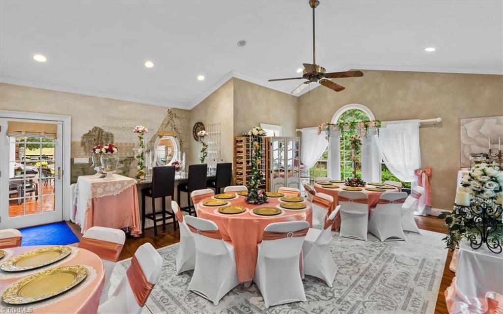 6352 Turnpike Road High Point, NC 27263 - Photo 16 of 49 The additional rec space has plenty of room for hosting dinners, murder mysteries, dancing, or any of your great ideas! Open to the back patio to flow outside as easily as inside the great space. If you wanted a main floor owner suite, this could be changed with minor changes and close off the great space and voila, a expansive owner suite awaits.