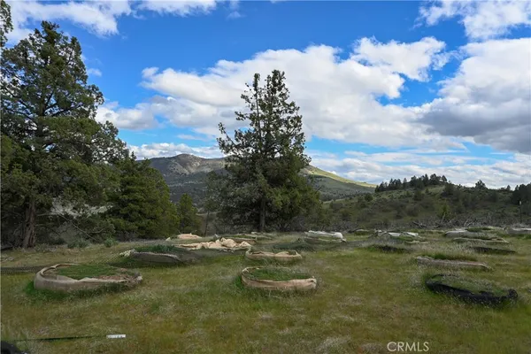 a view of a town with mountains in the background