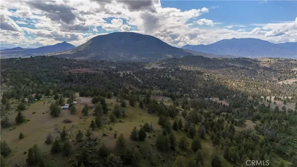 a view of a house with a mountain