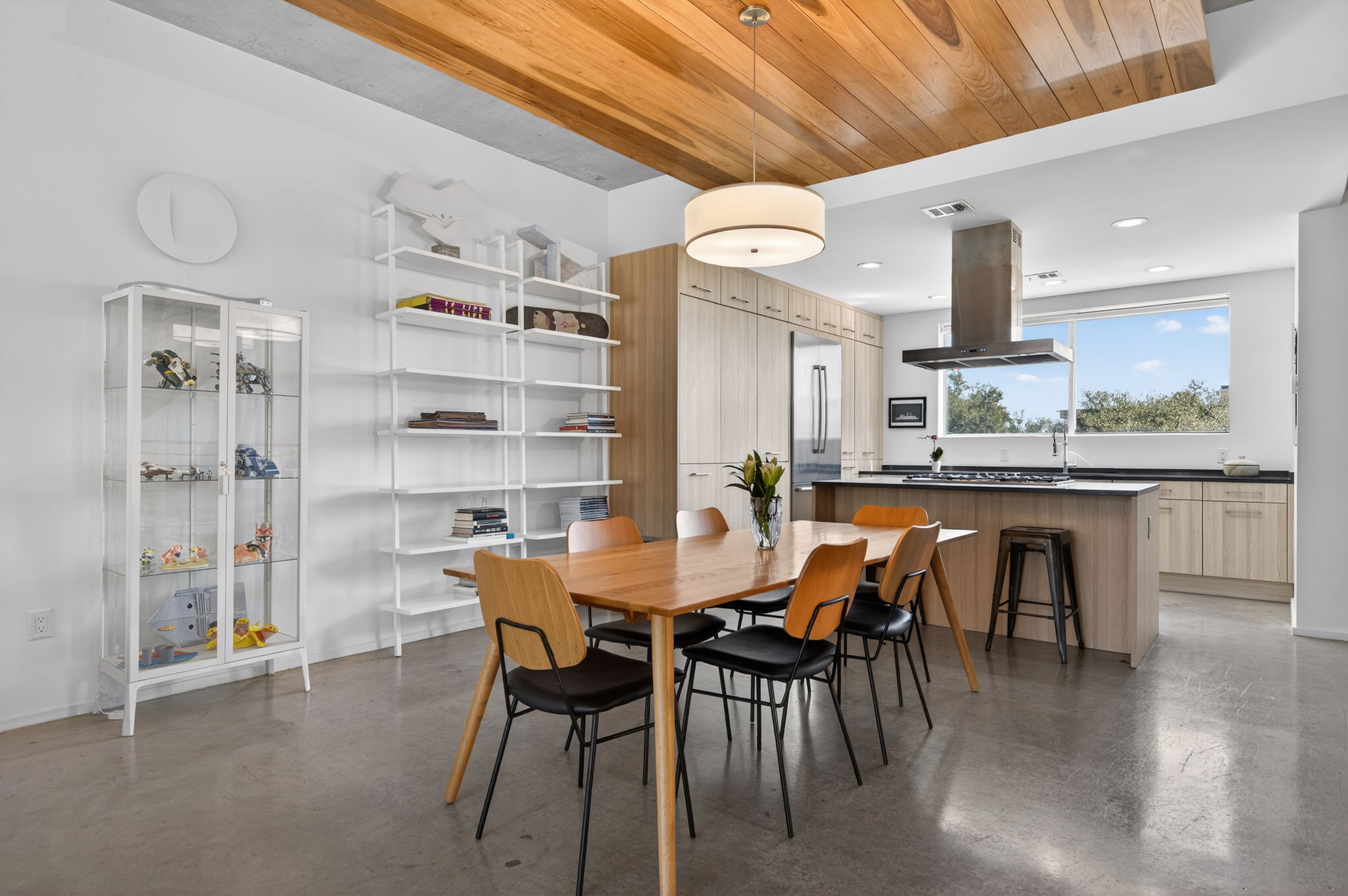 2301 South 5th Street, Unit 25 Austin, TX 78704 - Photo 1 of 35 Dining area featuring concrete flooring, wooden ceiling, and recessed lighting