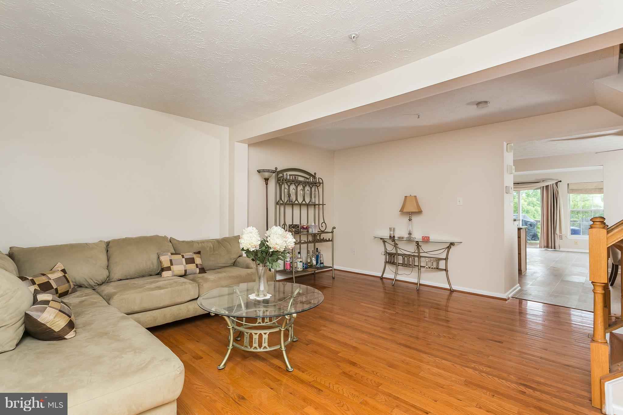 5143 Spring Willow Court Owings Mills, MD 21117 - Photo 2 of 29 Living Room with beautiful hardwood floors