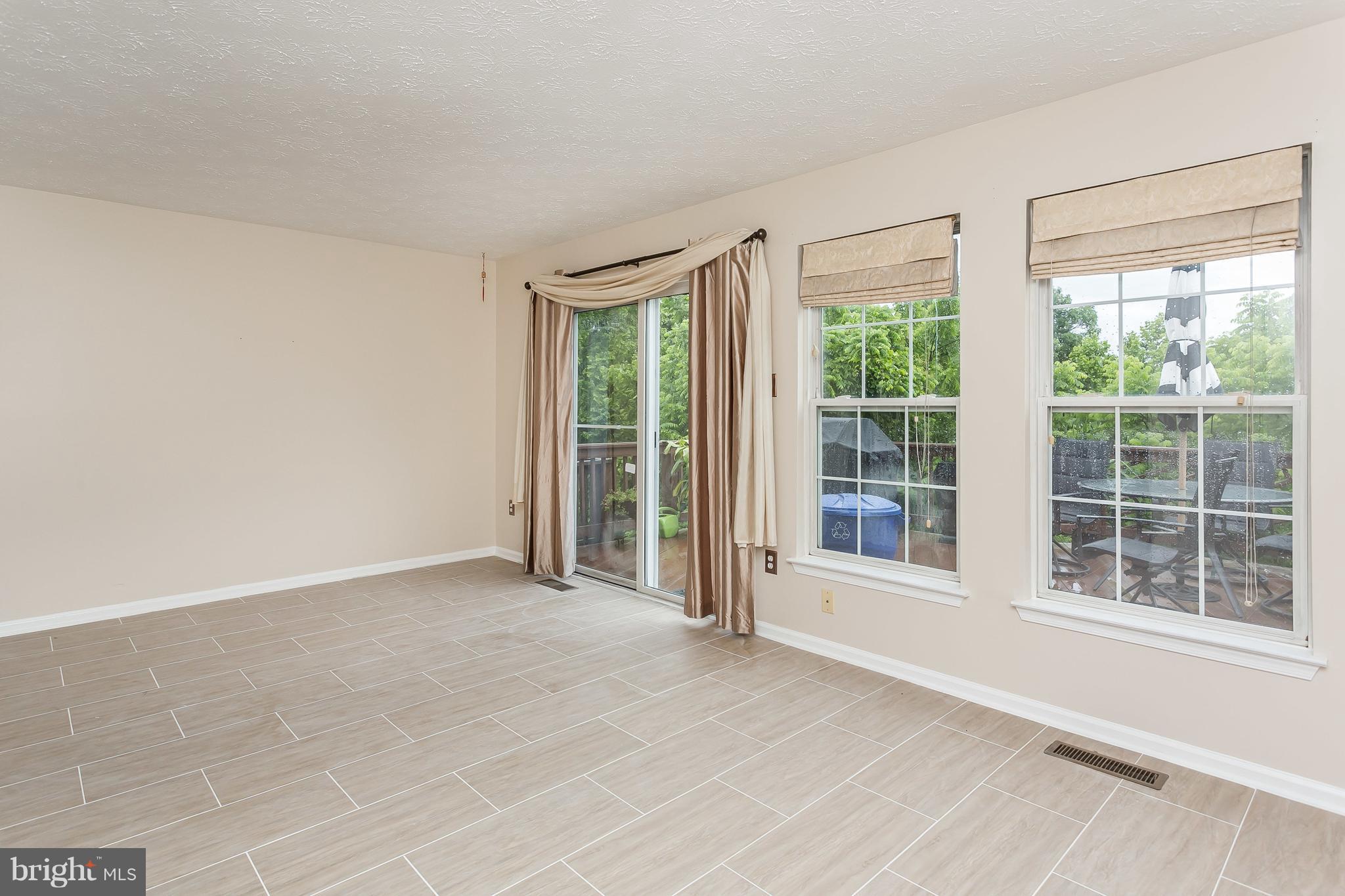 5143 Spring Willow Court Owings Mills, MD 21117 - Photo 12 of 29 View of Deck from Sunroom