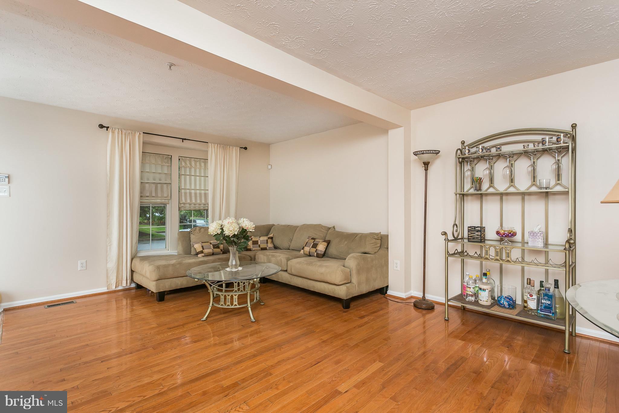 5143 Spring Willow Court Owings Mills, MD 21117 - Photo 3 of 29 Living Room with beautiful hardwood floors