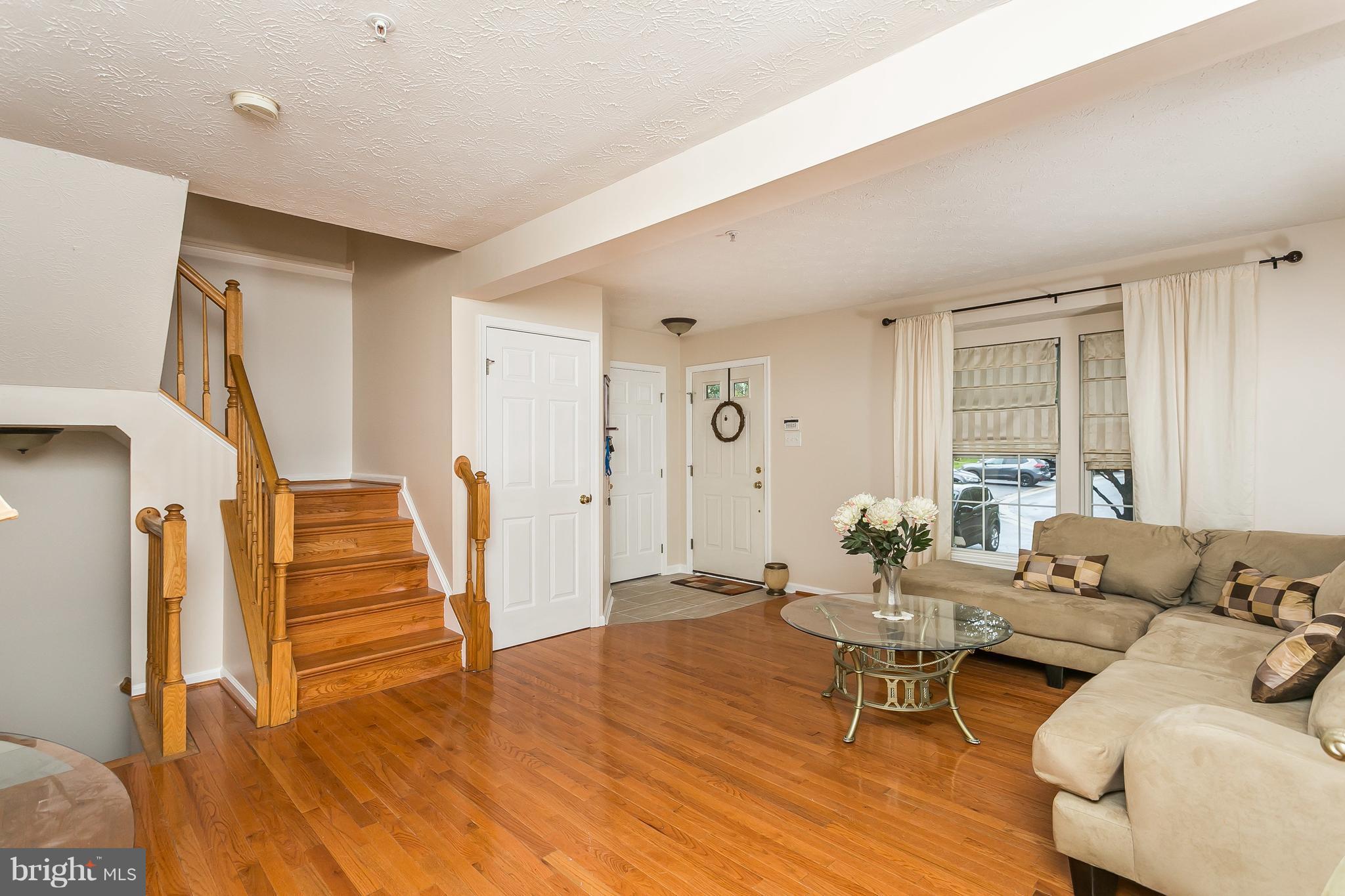 5143 Spring Willow Court Owings Mills, MD 21117 - Photo 4 of 29 Living Room with beautiful hardwood floors