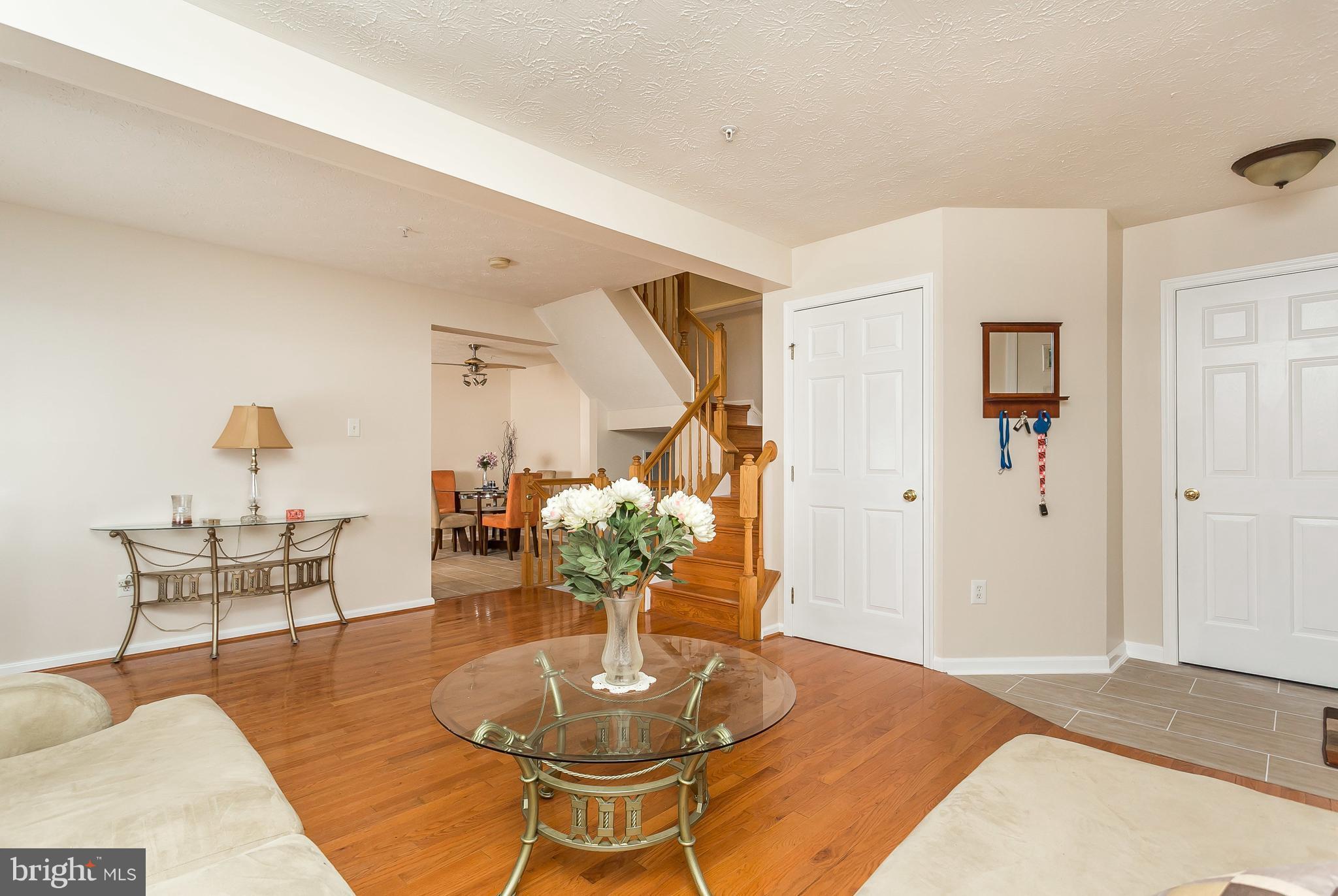 5143 Spring Willow Court Owings Mills, MD 21117 - Photo 5 of 29 Living Room with beautiful hardwood floors