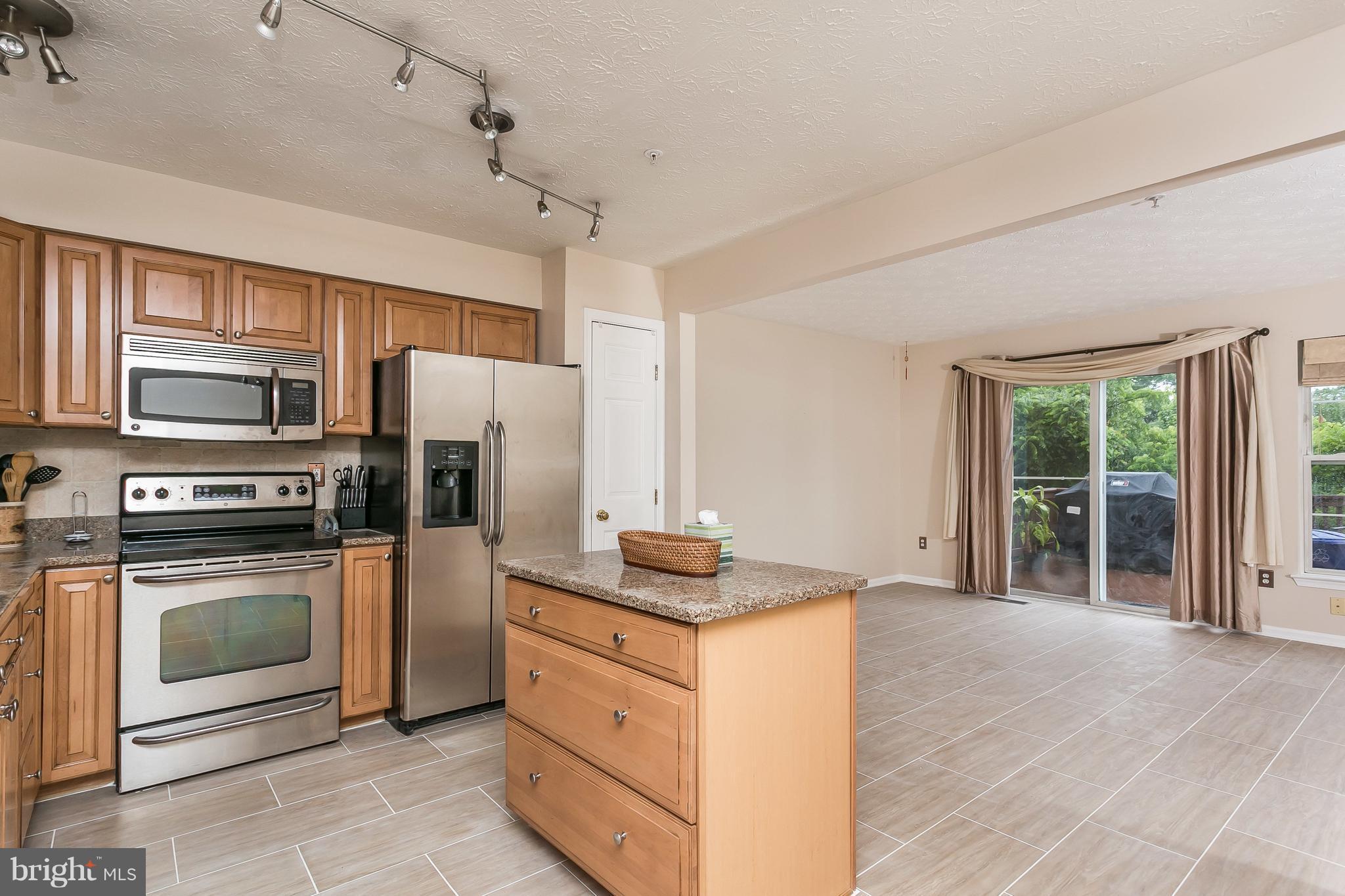 5143 Spring Willow Court Owings Mills, MD 21117 - Photo 6 of 29 Brand new floors in Kitchen