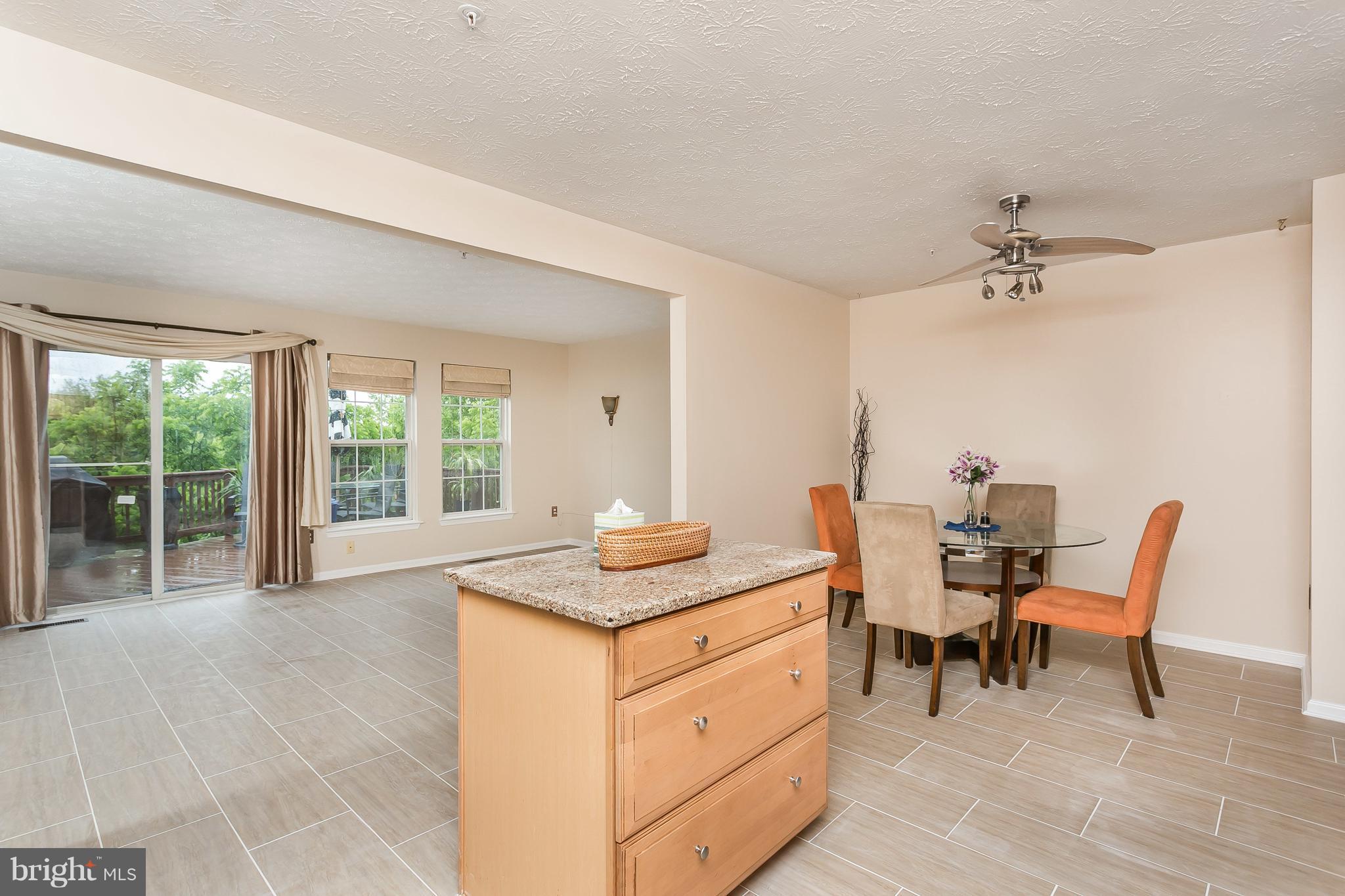 5143 Spring Willow Court Owings Mills, MD 21117 - Photo 9 of 29 Looking into Sunroom and Large Deck