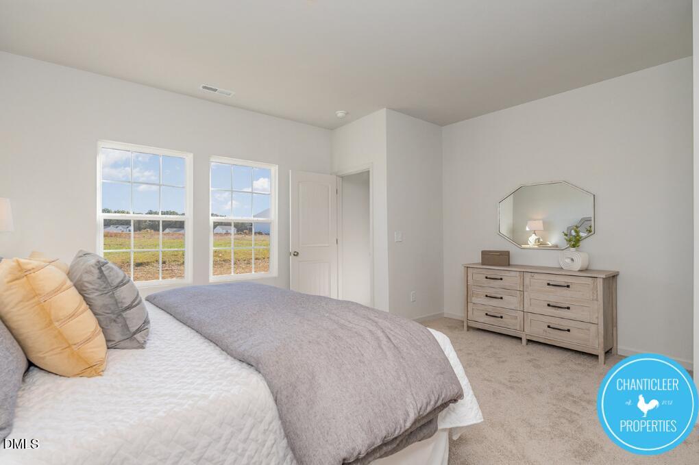 66705 Hardwick Lane Sims, NC 27880 - Photo 11 of 18 a bedroom with a bed and window