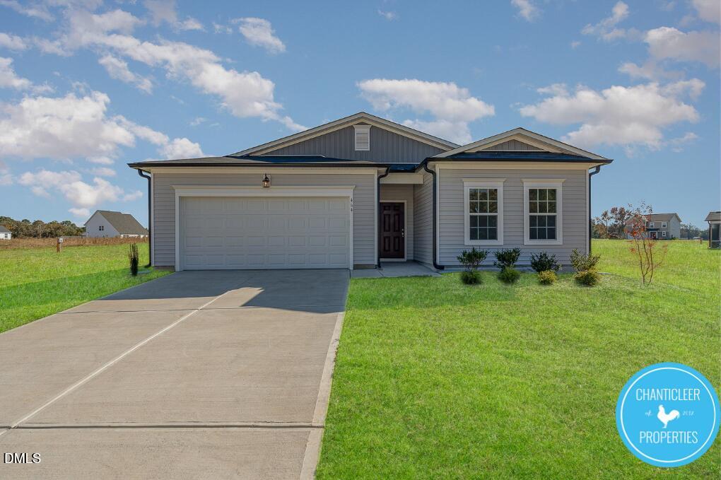 66705 Hardwick Lane Sims, NC 27880 - Photo 2 of 18 a front view of house with yard and green space