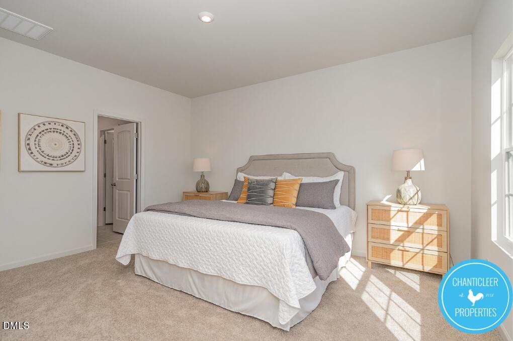 66705 Hardwick Lane Sims, NC 27880 - Photo 10 of 18 a bedroom with a bed and painting on the wall
