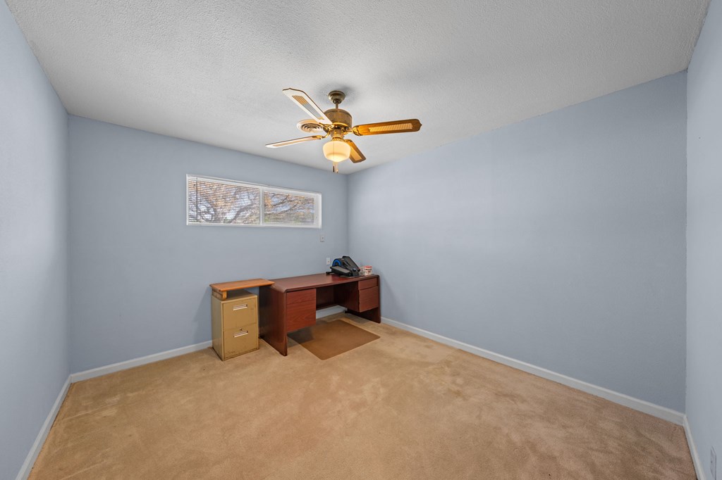 4317 Highway 173 Bandera, TX 78003 - Photo 12 of 35 a view of workspace with a window