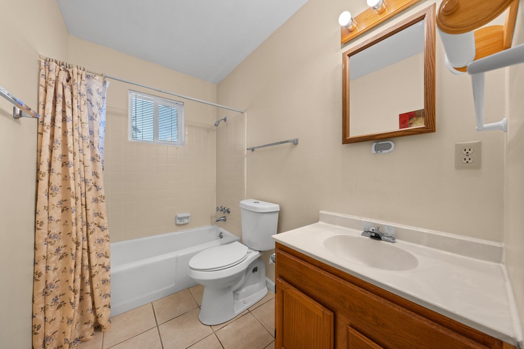 4317 Highway 173 Bandera, TX 78003 - Photo 13 of 35 a bathroom with a sink a toilet and shower