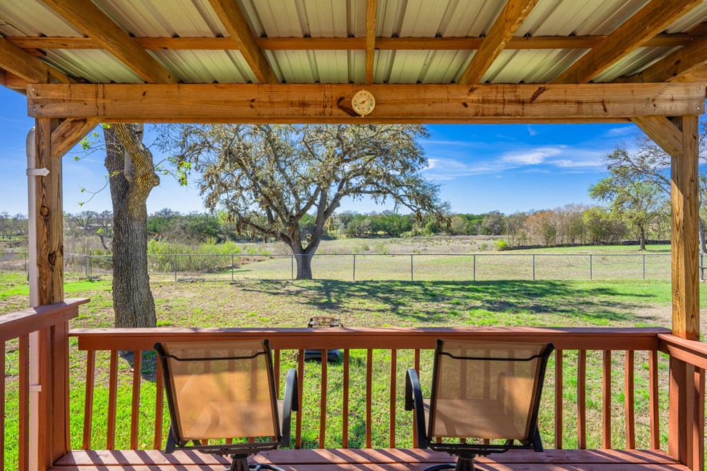 4317 Highway 173 Bandera, TX 78003 - Photo 17 of 35 a view of a yard with wooden fence