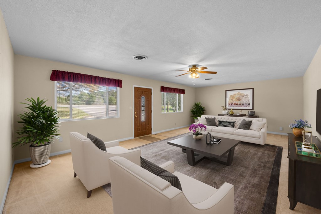 4317 Highway 173 Bandera, TX 78003 - Photo 4 of 35 a living room with furniture and flowers