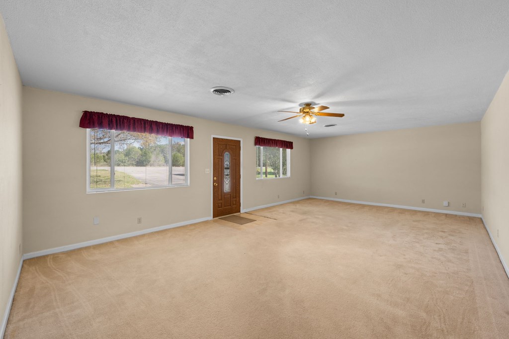 4317 Highway 173 Bandera, TX 78003 - Photo 5 of 35 a view of an empty room with a window